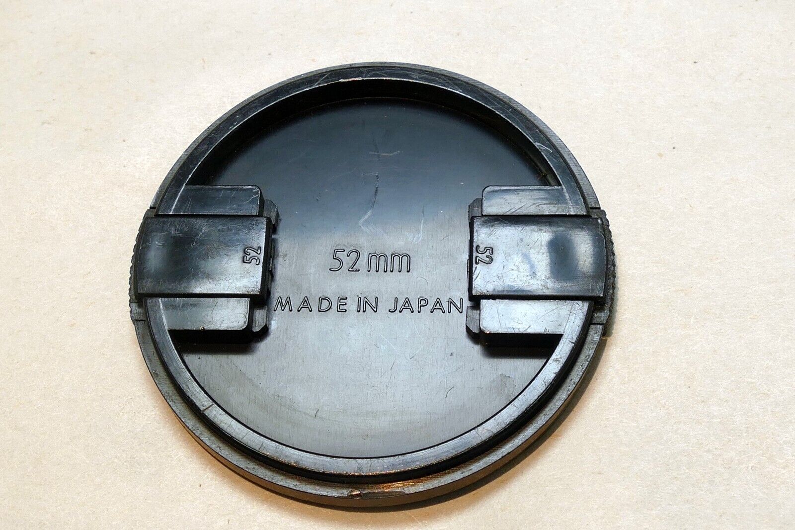 Sigma 52mm lens front cap (snap on type) for 28mm mini-wide