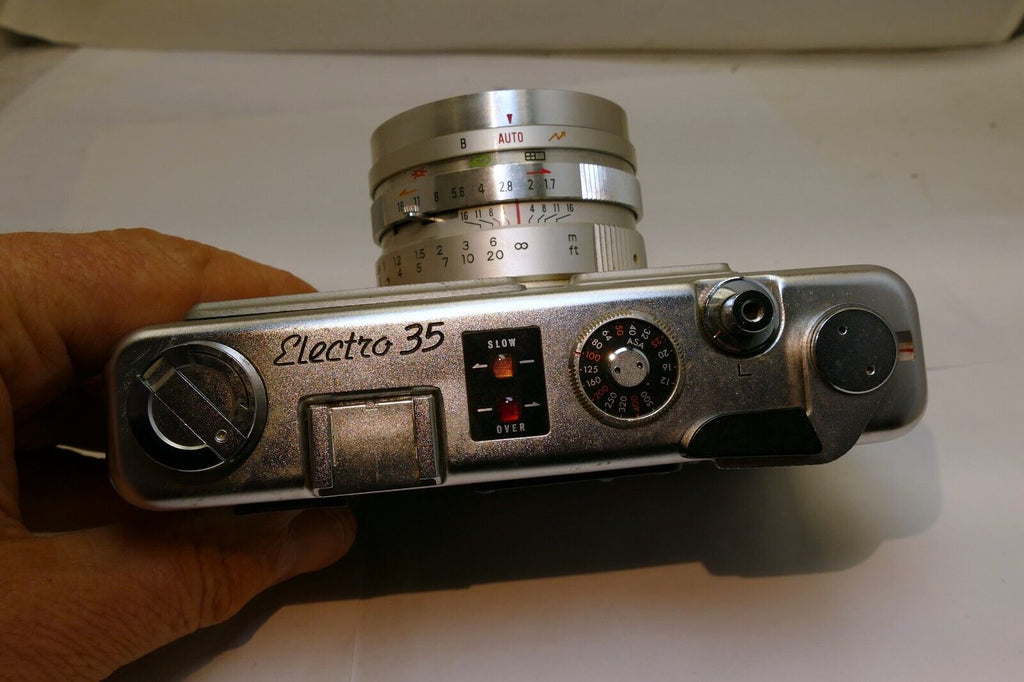 Yashica Electro 35 camera with 45mm f1.7 lens AS IS missing battery cover parts