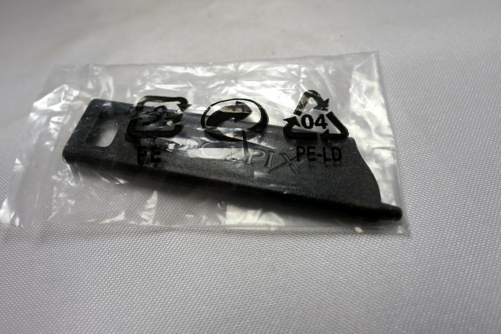 Nikon Coolpix camera plastic key pin