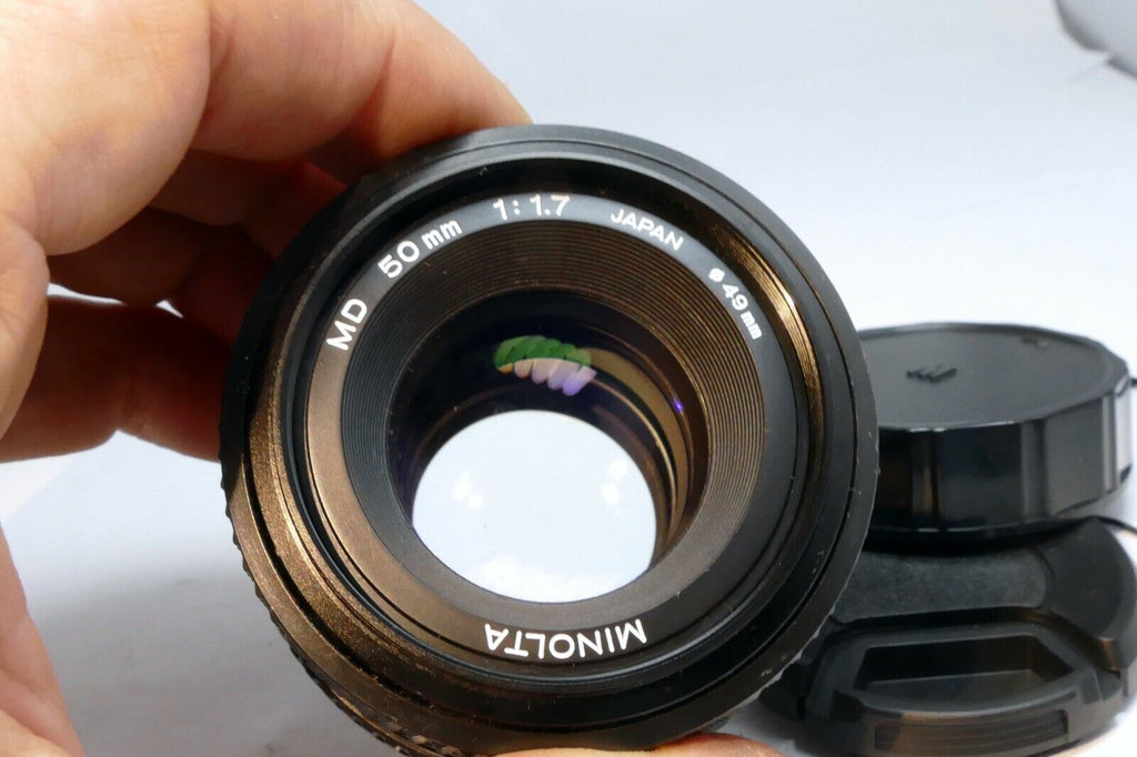 Minolta 50mm f1.7 MD manual focus with couple spots of fungus webbing works good