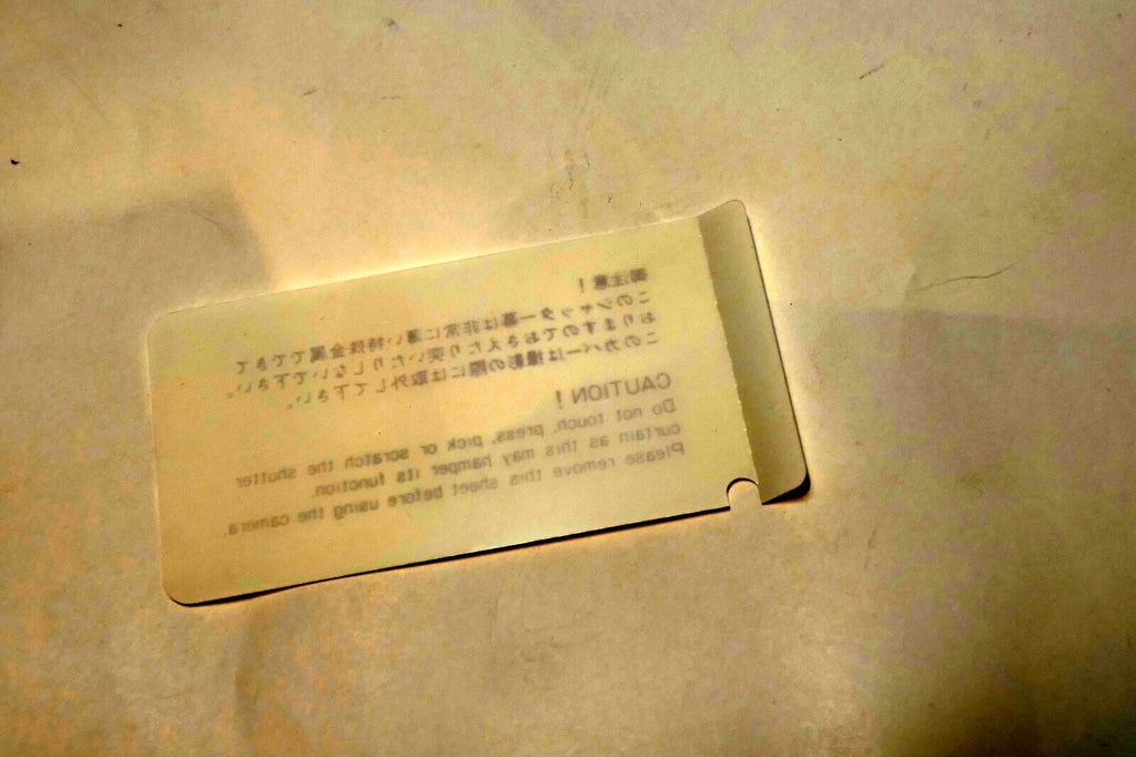 Nikon Caution add for FM2 shutter cover   1980's