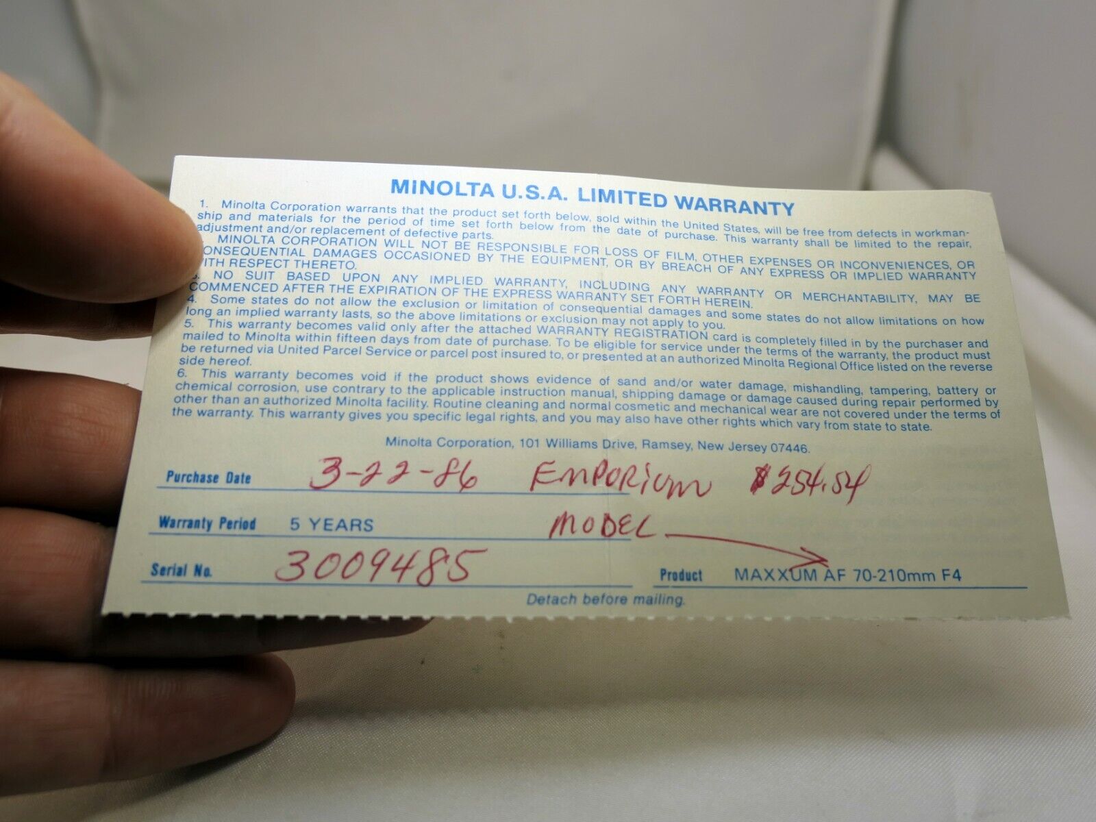 MINOLTA used  warranty card  for Maxxum  AF 70-210mm f4 lens