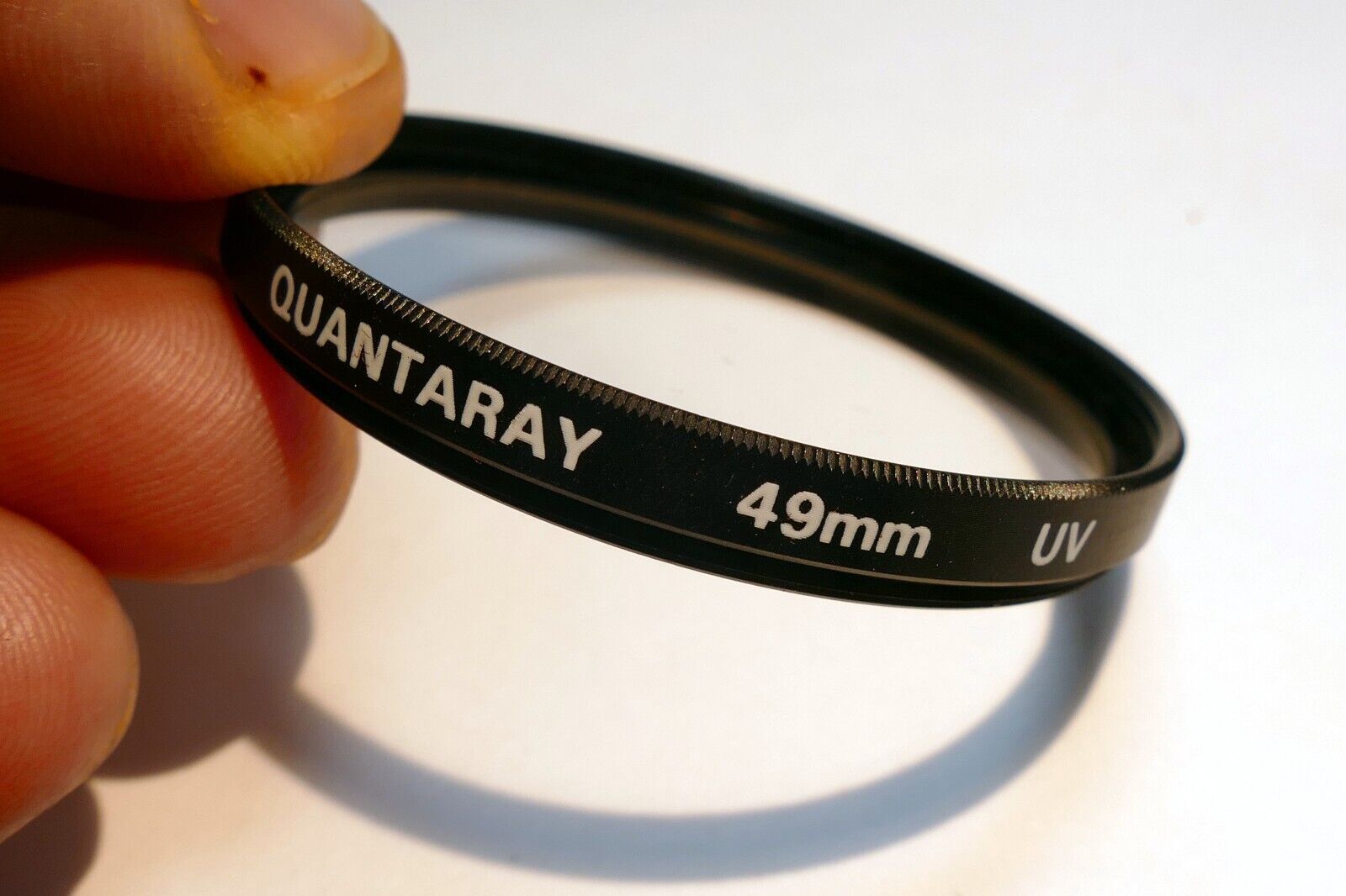 Quantaray 49mm Lens Filter UV threaded screw in type made in Japan
