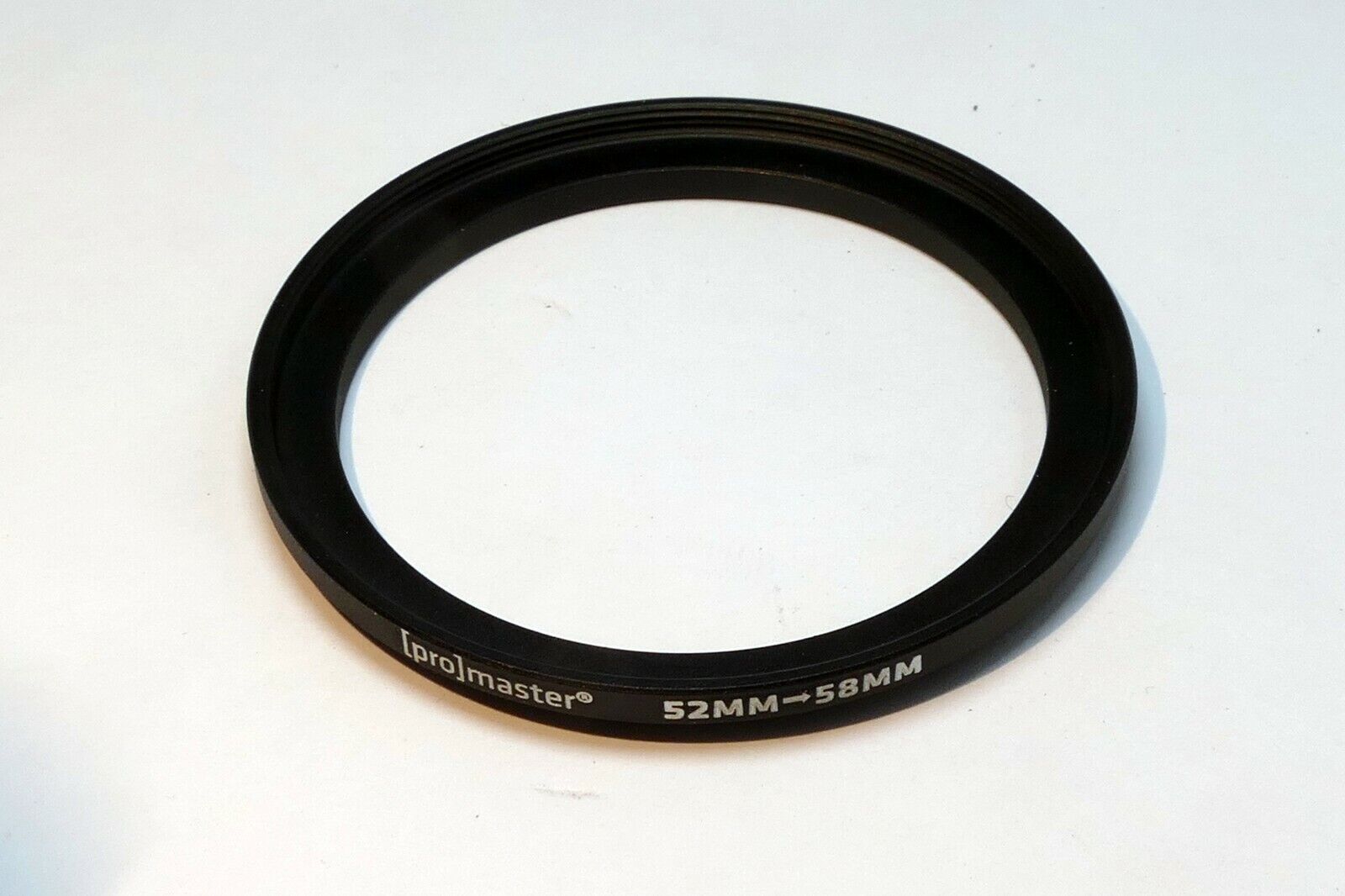 Promaster 52mm to 58mm Step-up ring Metal adapter double threaded ribbed rim