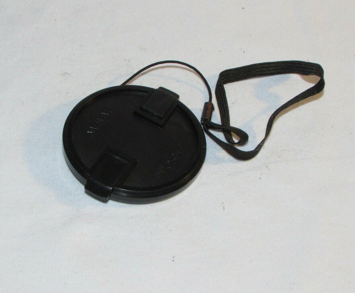 Black 55mm Lens Front Cap Made in Taiwan with keeper string B01630