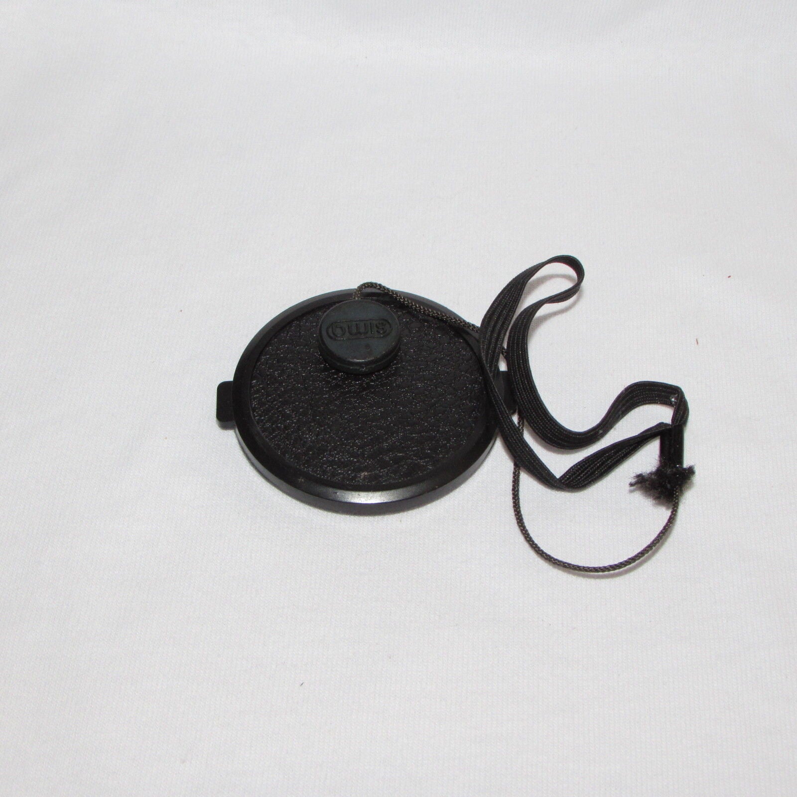 Black 49mm Lens Front Cap Made in Hong Kong with keeper string B01418