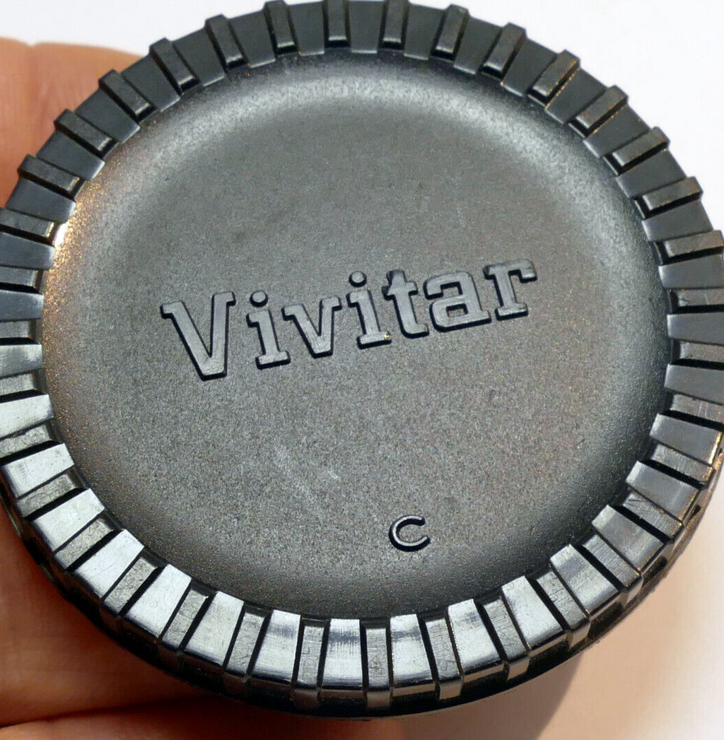 Camea Body cap for Canon FDmount cameras AE-1 or 2X teleconverter lens front