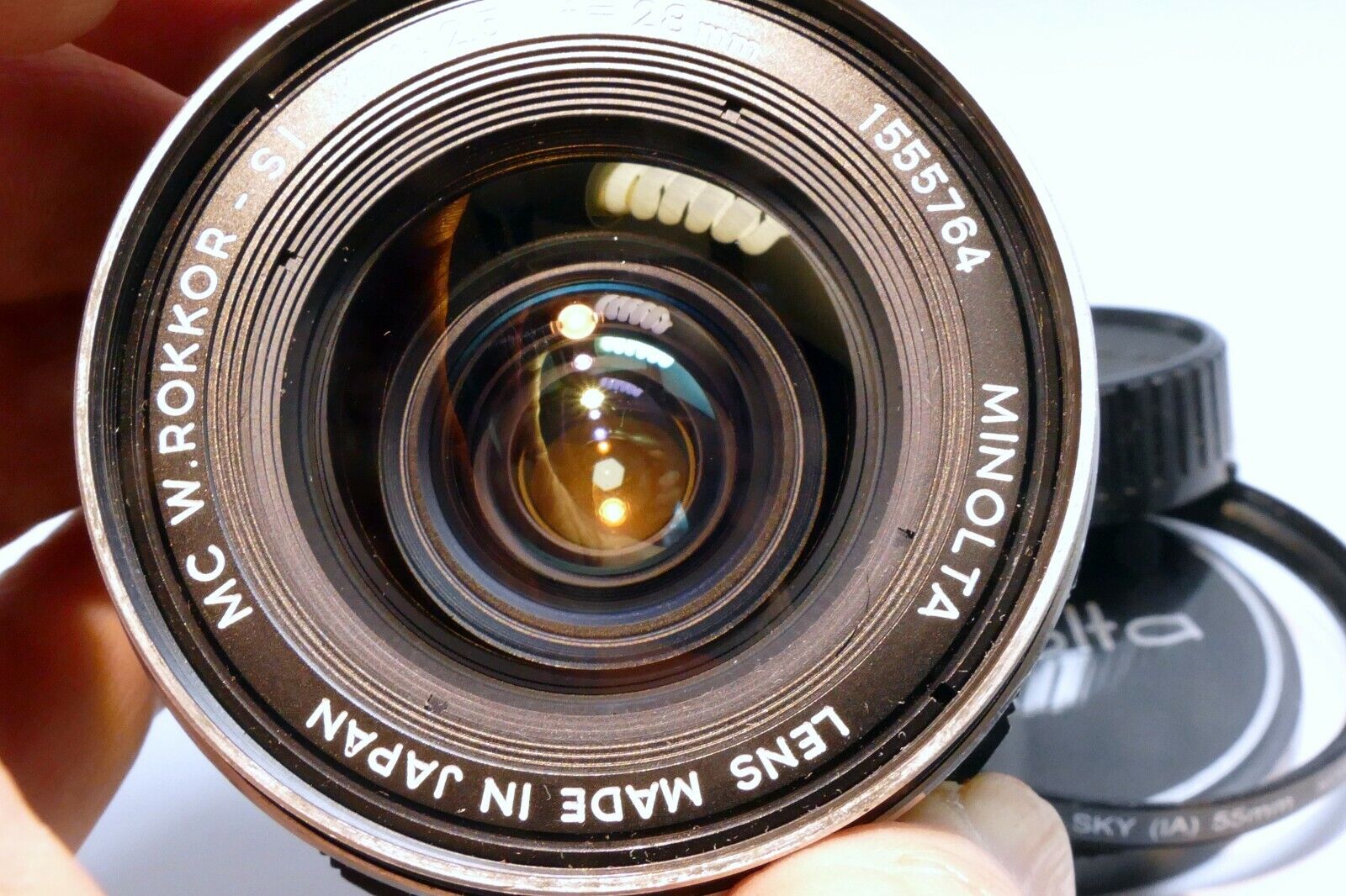 Minolta 28mm f2.5 Lens manual Focus MC W Rokkor- SI ( slow aperture, and dust )