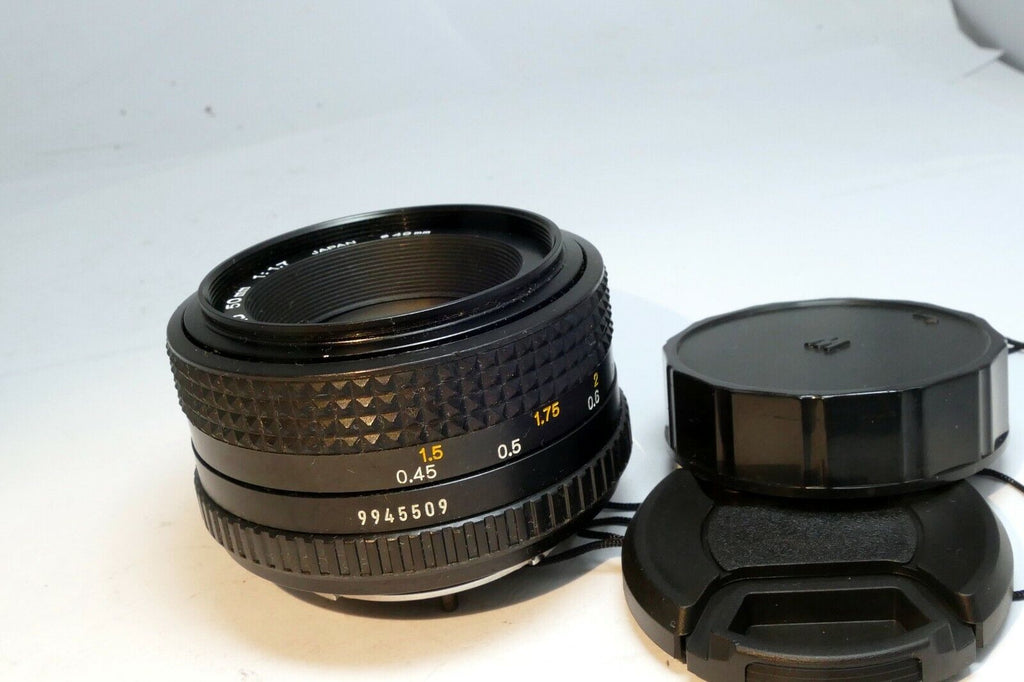 Minolta 50mm f1.7 MD manual focus with couple spots of fungus webbing works good