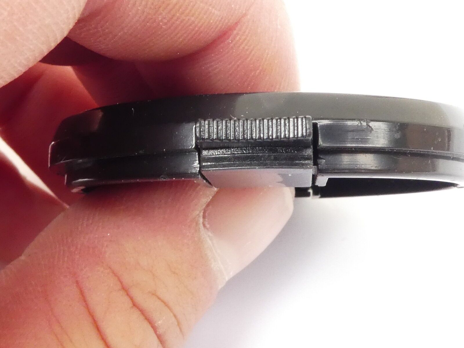 Used 49mm Lens Front Cap Black snap-on type made in Taiwan plastic