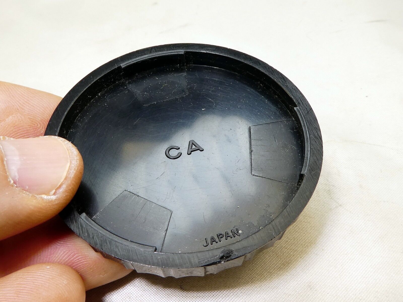 CA rear lens cap twist on type