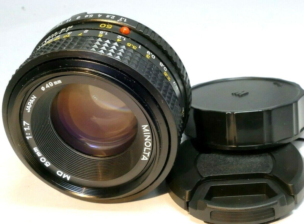 Minolta 50mm f1.7 MD manual focus with couple spots of fungus webbing works good
