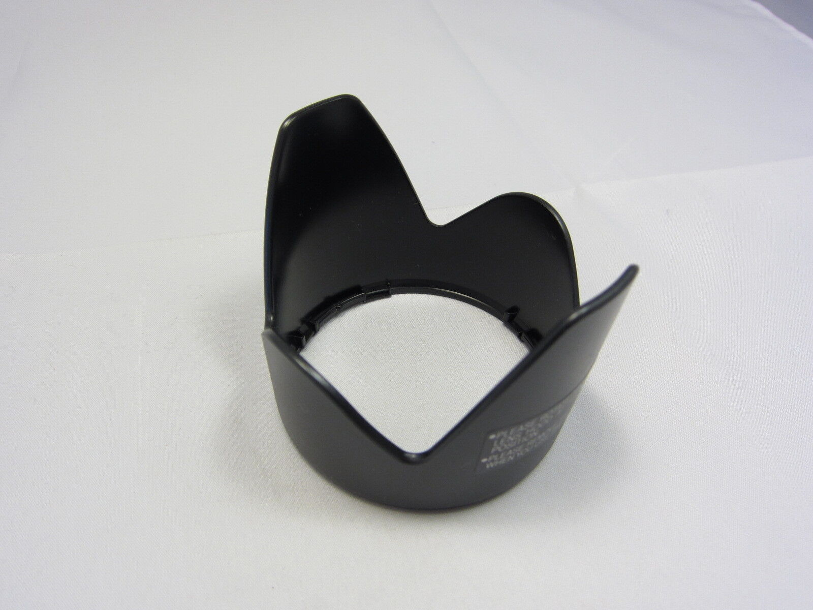Used Unknow Brand Plastic 55mm Twist on Lens Hood 9301055