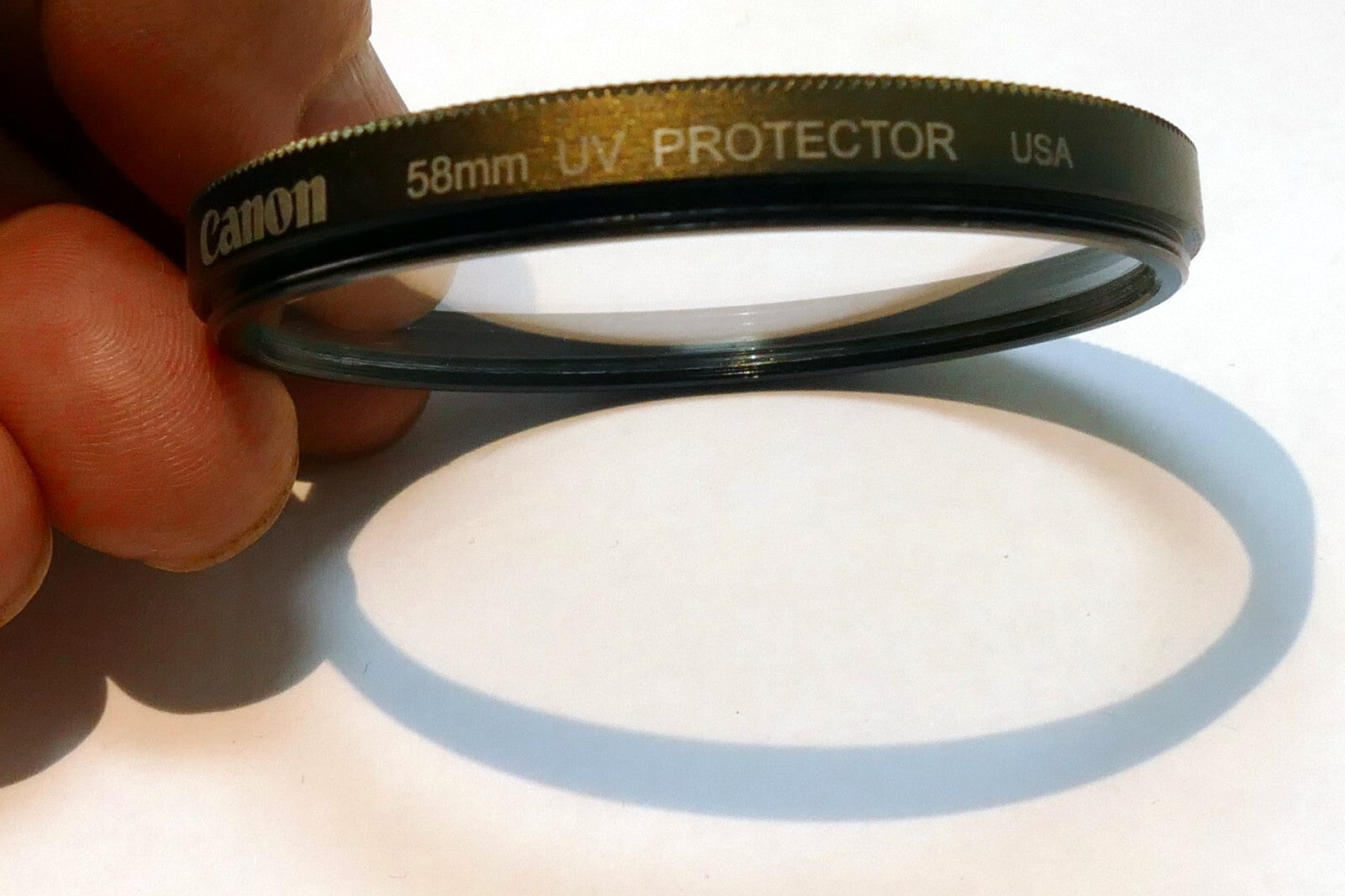 Canon 58mm Lens Protect filter for 18-55mm IS EF-s - bronze gold tone rim - OEM