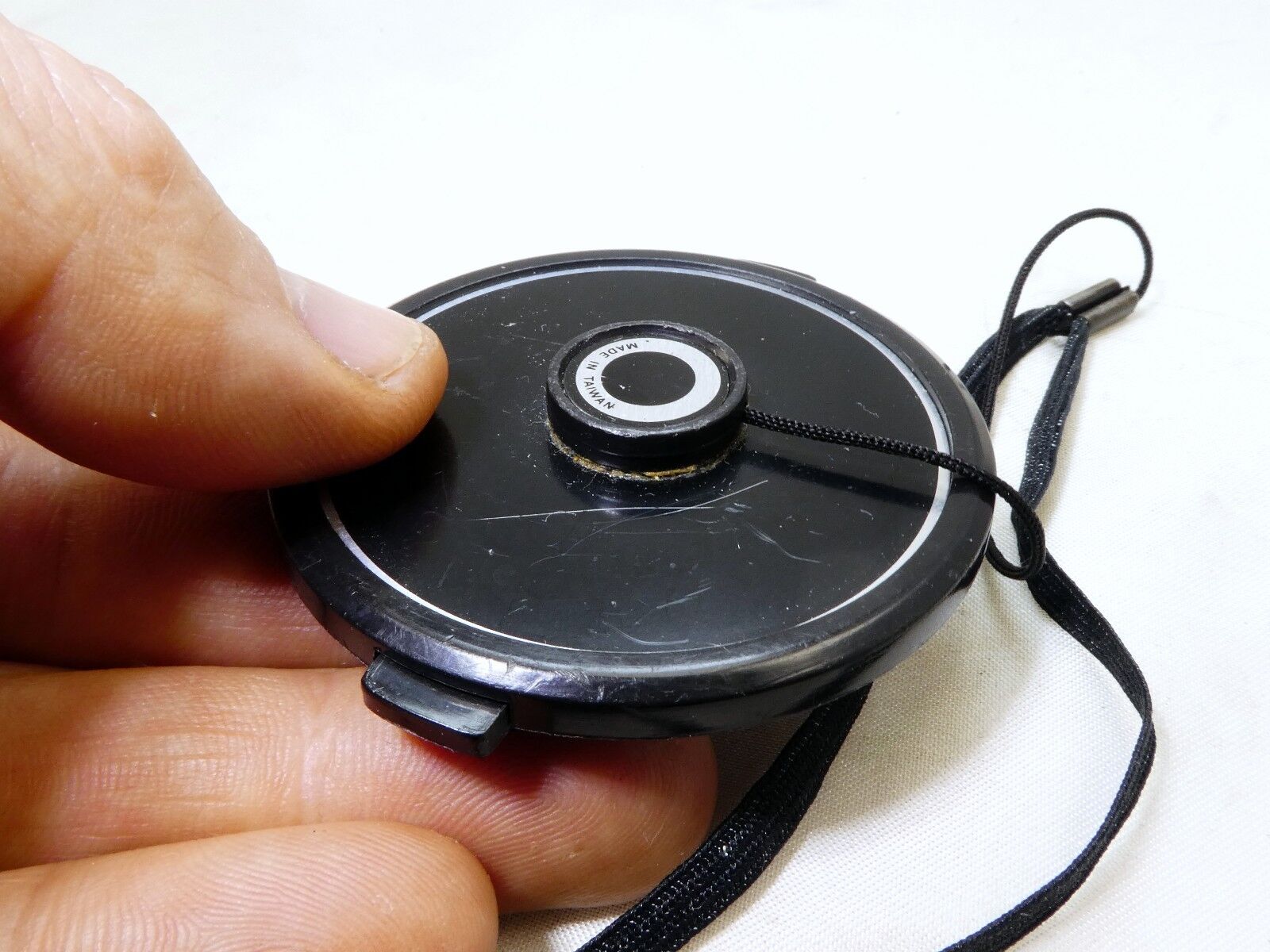 Black 55mm Lens front Cap  Snap on type with keeper string holder