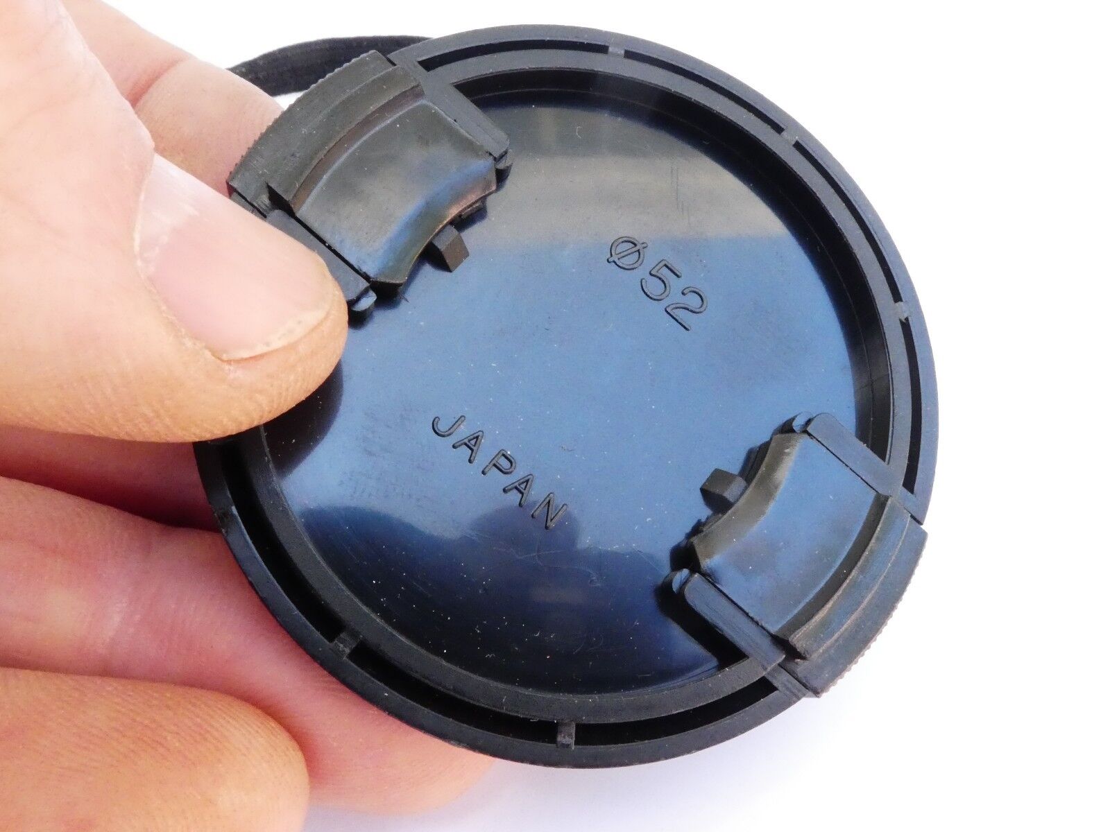 Promaster 52mm Front  Lens cap plastic snap on type 2 Japan with strap