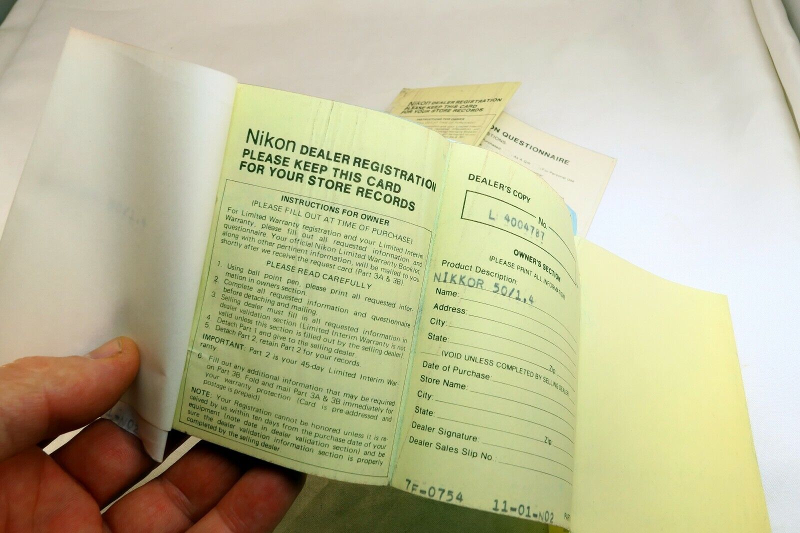 Nikon vintage warranty card (expired) for Nikkor 50mm f1.4 Non  Ai lens 1977