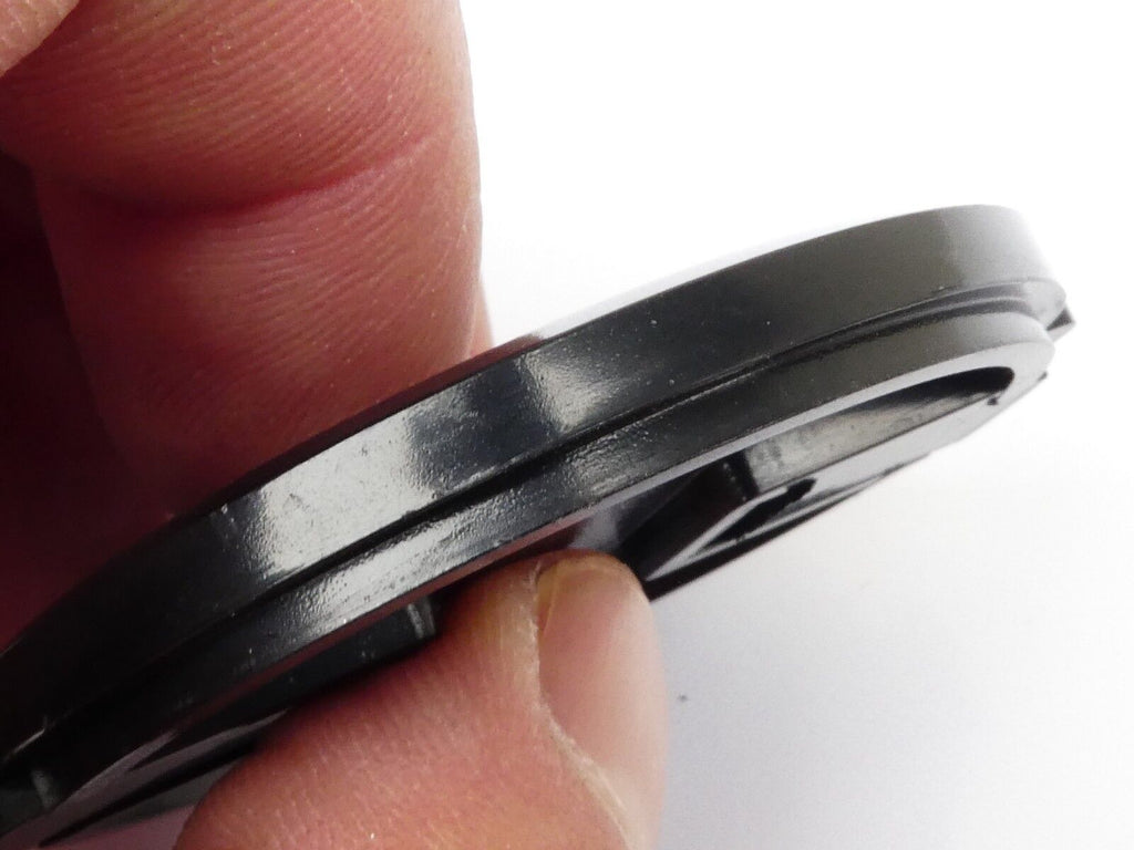 Used 49mm Lens Front Cap Black snap-on type made in Hong Kong plastic