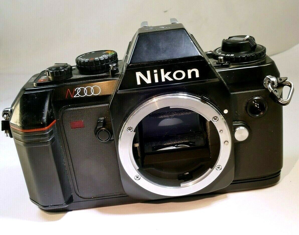 Nikon N2000 Manual Focus camera body (for parts does not work AS IS )