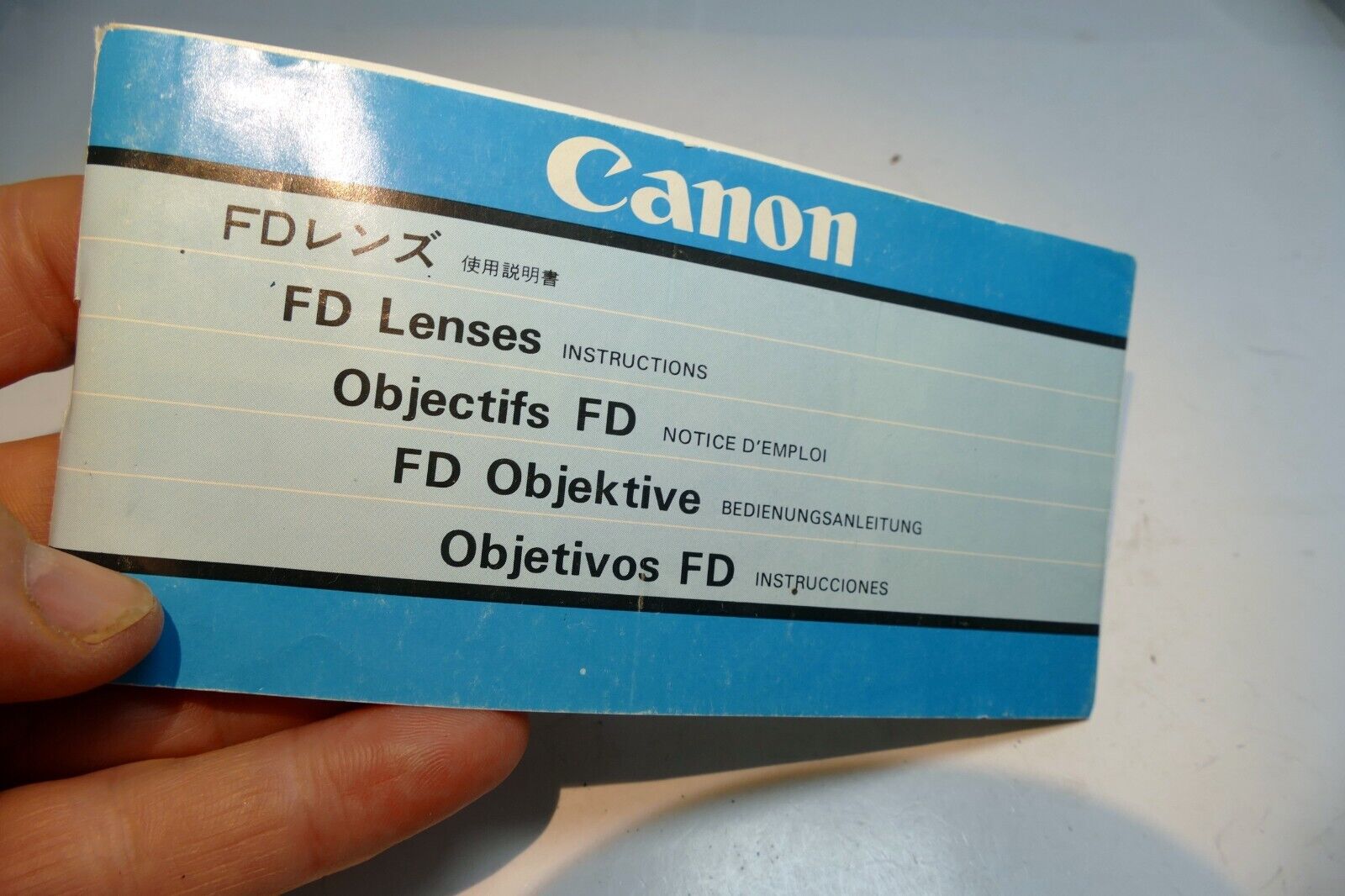 Canon FD lens table guide brochure (manual focus ) J E F G S