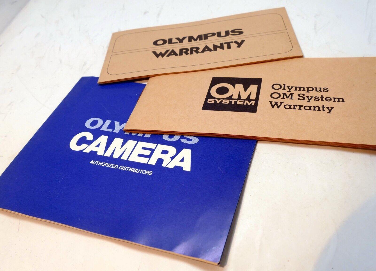 Olympus OM-2 camera warranty card vintage 1970's
