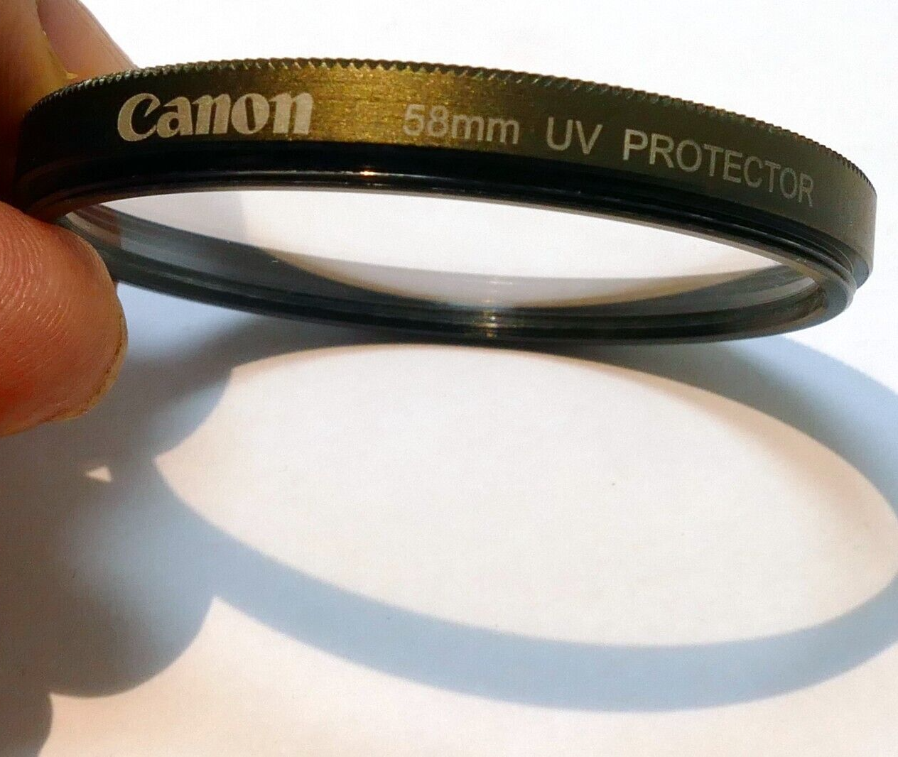 Canon 58mm Lens Protect filter for 18-55mm IS EF-s - bronze gold tone rim - OEM