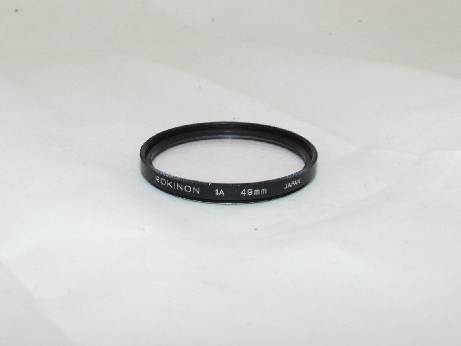 Used Rokinon 1A (skylight) 49mm Lens Filter Made in Japan O31732