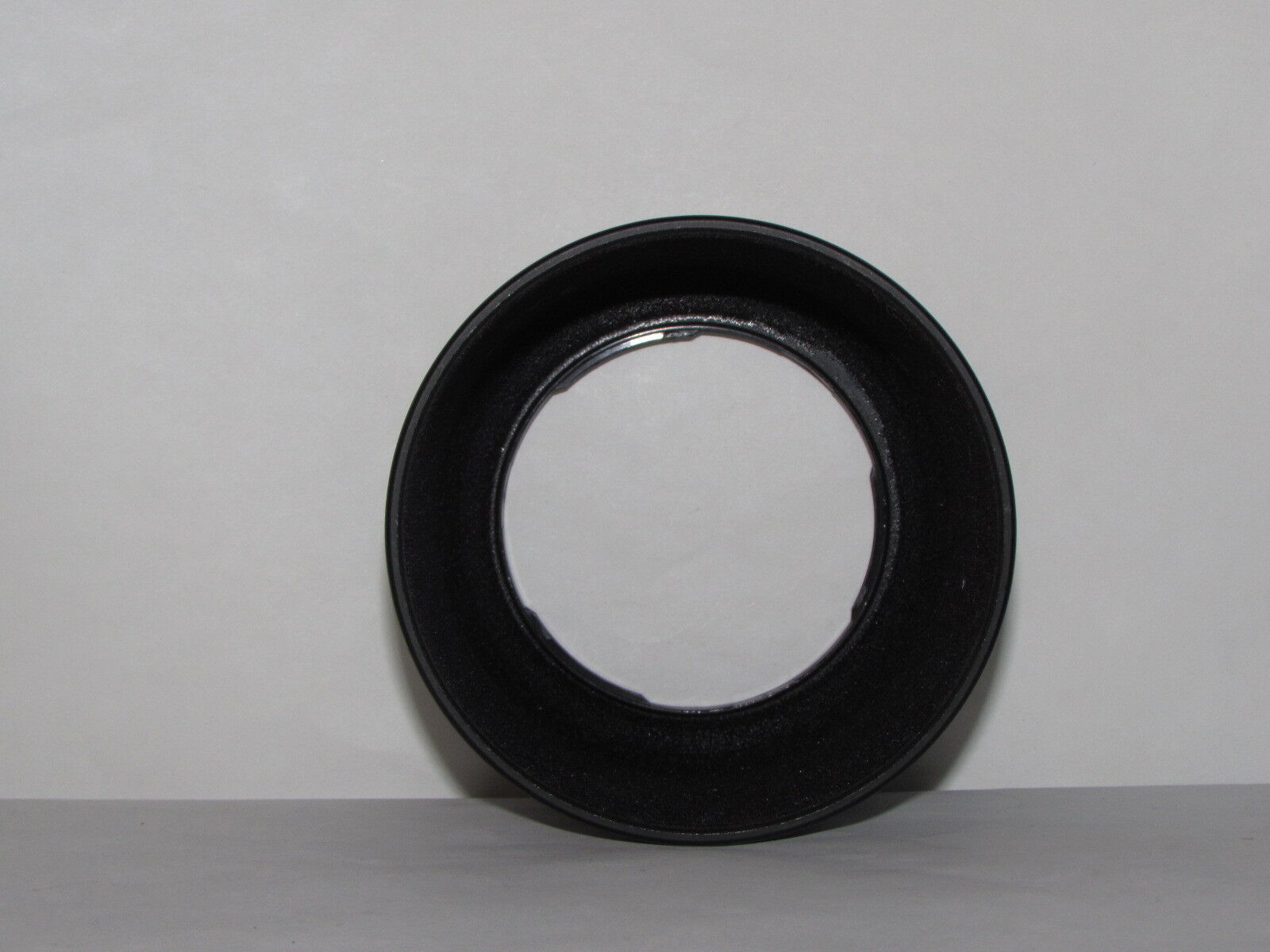 57mm ID Twist on  Lens Hood unknown brand or model  for 52mm rim