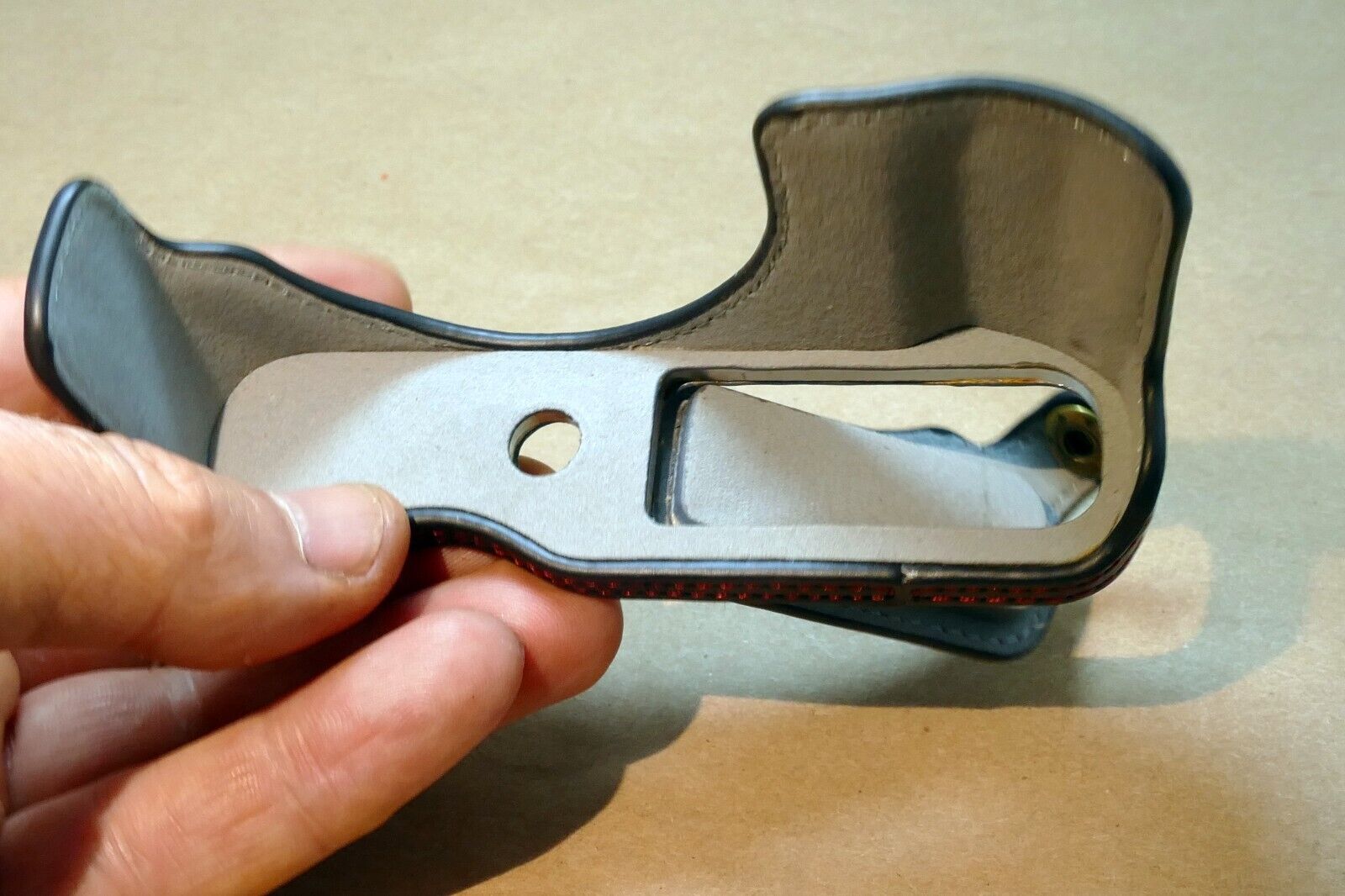 Black Half Case for Fujifilm X-T100 camera (missing tripod screw)