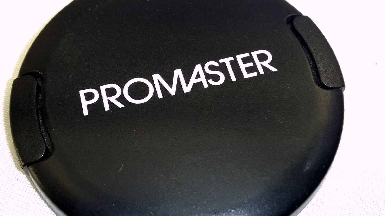 Promaster  52mm Front Lens Cap  for 24mm f2.8 28mm AF