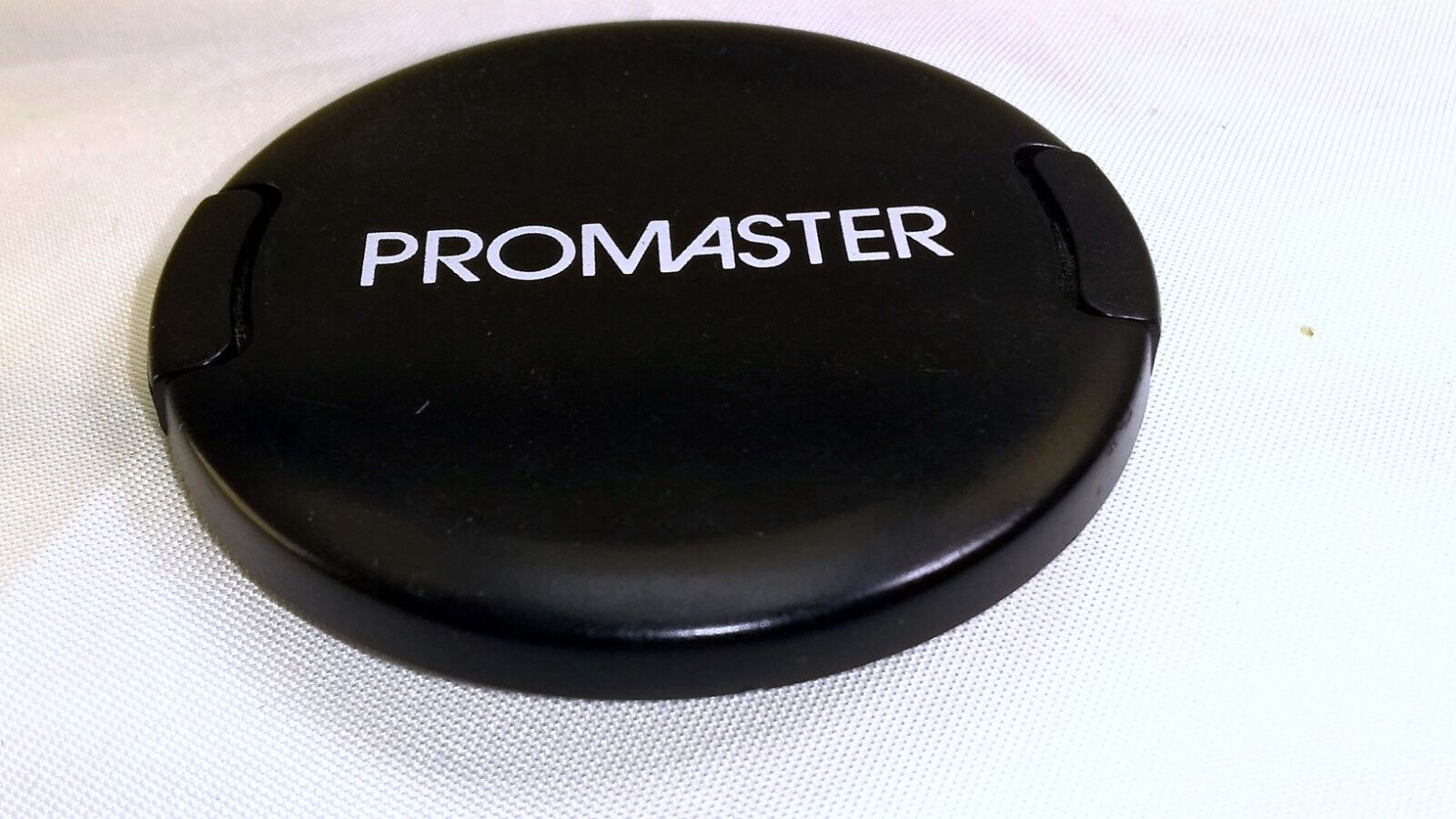 Promaster  52mm Front Lens Cap  for 24mm f2.8 28mm AF