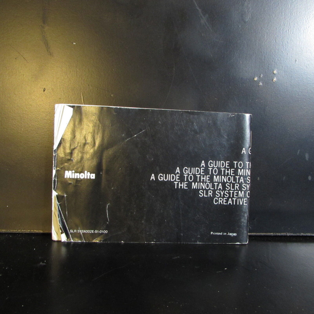 Minolta Guide to X XD MD SLR system Guide Accessory list English O401624