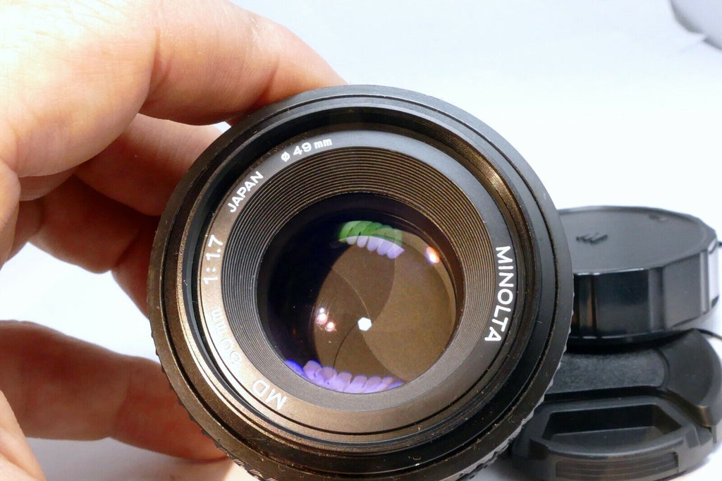 Minolta 50mm f1.7 MD manual focus with couple spots of fungus webbing works good