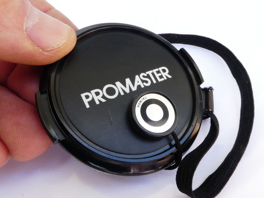 Promaster 52mm Front  Lens cap plastic snap on type 2 Japan with strap