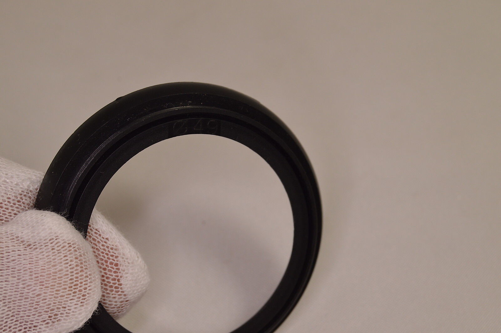 Plastic lens ring 49-49mm not sure for what lens 9216034