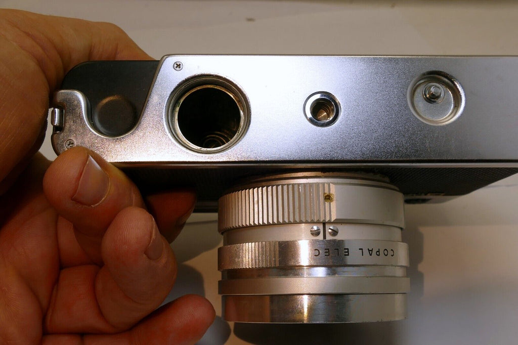 Yashica Electro 35 camera with 45mm f1.7 lens AS IS missing battery cover parts