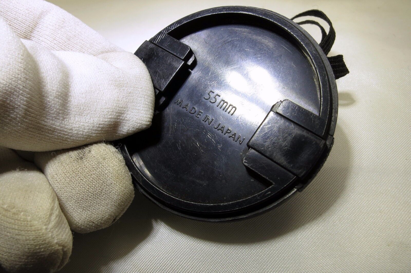 Sigma 55mm Front Cap dust cover with keeper string