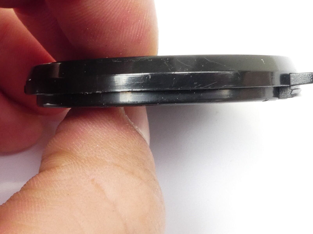 Used 49mm Lens Front Cap Black snap-on type made in Taiwan plastic
