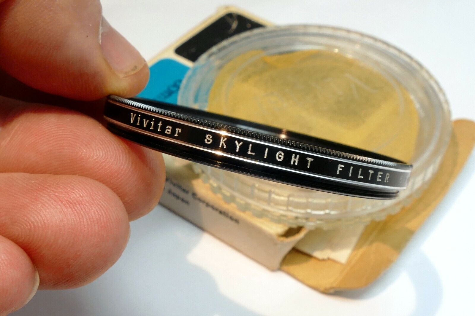 Vivitar 55mm Filter Skylight 1A  with plastic case (with some scratches)