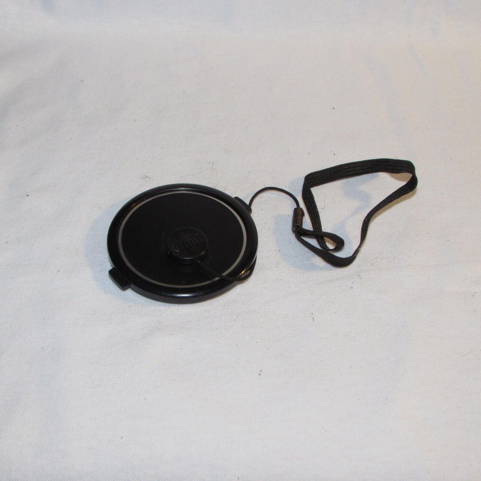 Black 55mm Lens Front Cap Made in Taiwan with keeper string B01630