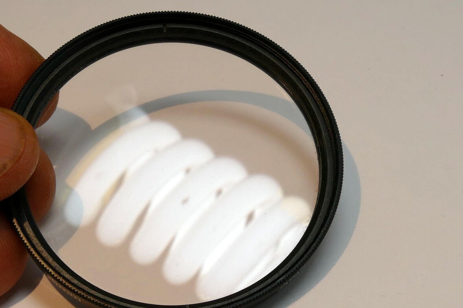 Vivitar  55mm Filter Skylight 1A sky  ( with coating scratched )