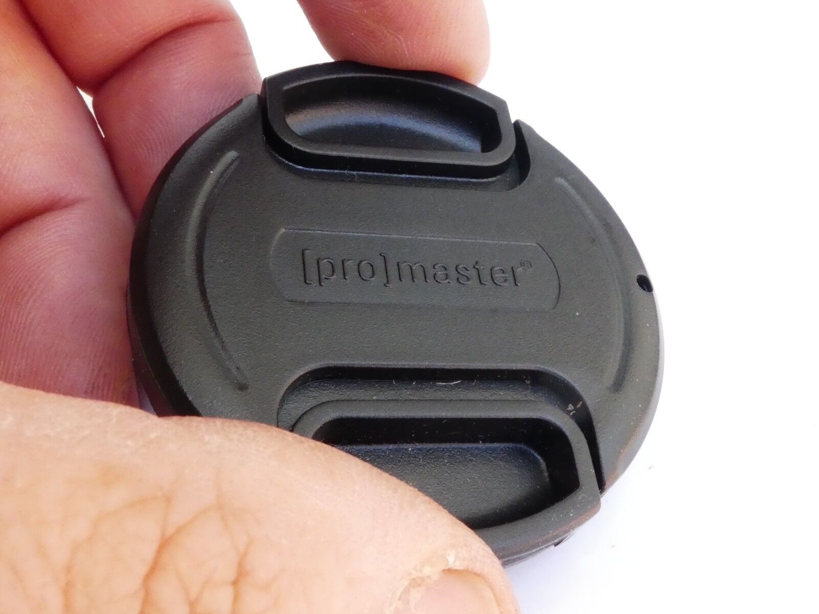 Promaster 52mm Front  Lens cap plastic snap on type