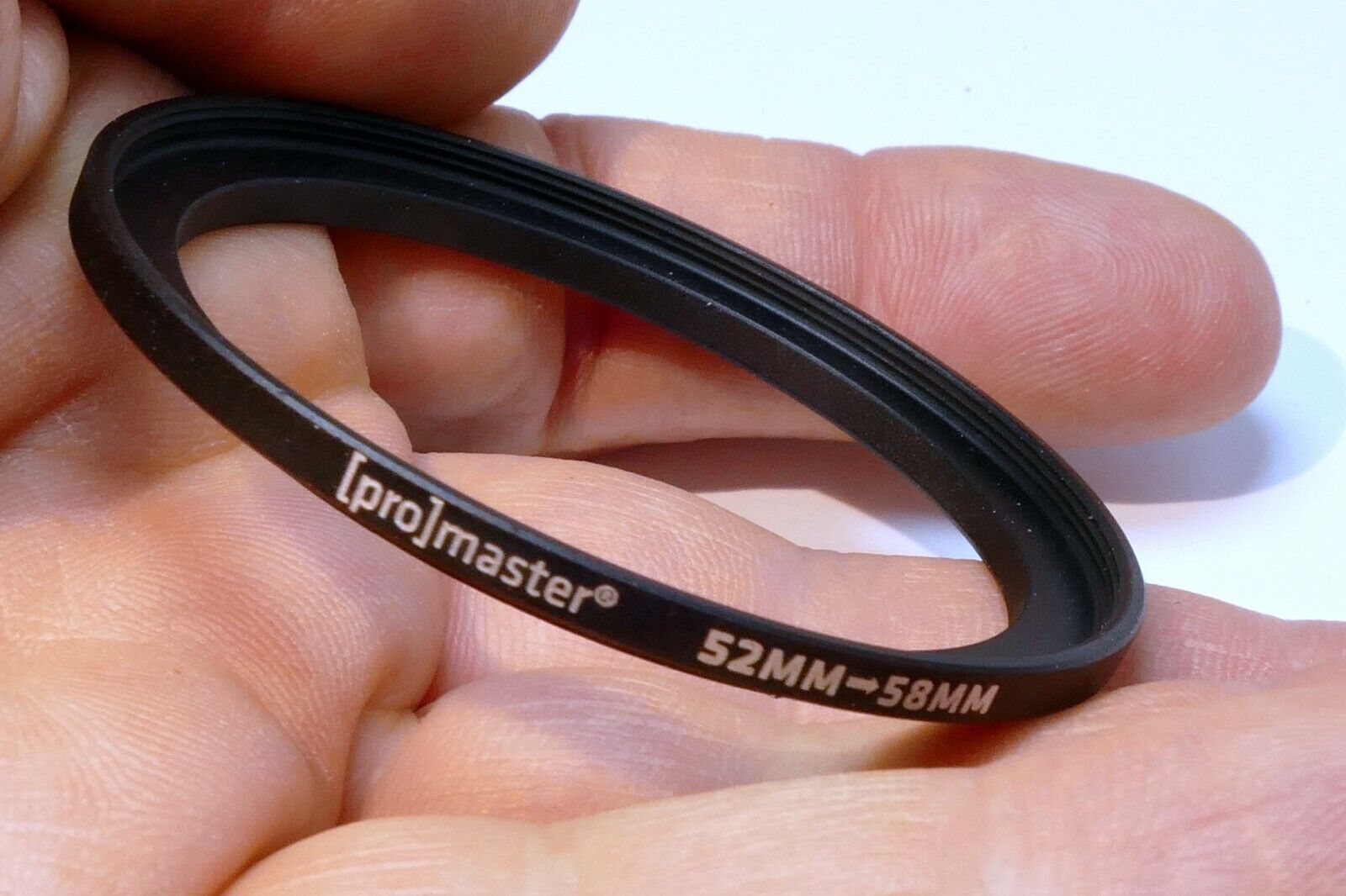 Promaster 52mm to 58mm Step-up ring Metal adapter double threaded ribbed rim