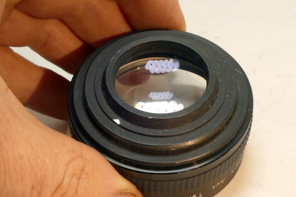 Hanimex AUX Telephoto 49mm Lens for Praktica (with some haze)