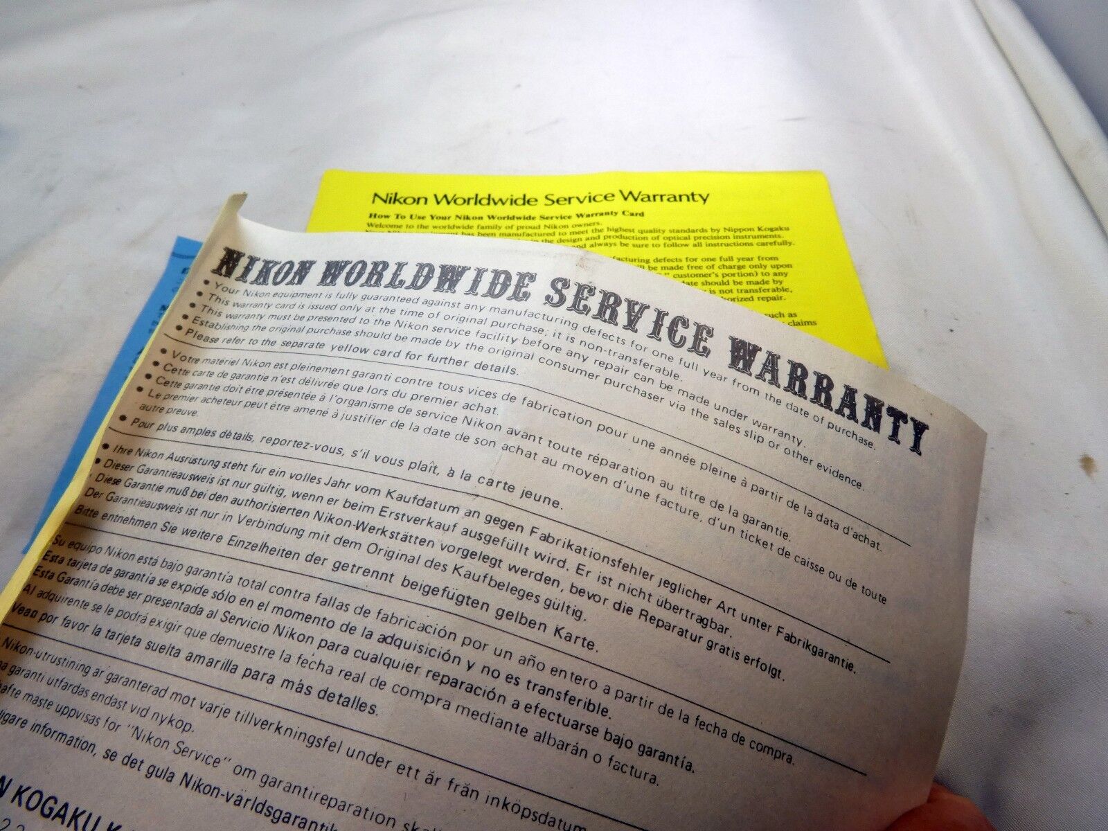 Nikon vintage 28mm f3.5 Ai-s Nikor lens warranty card