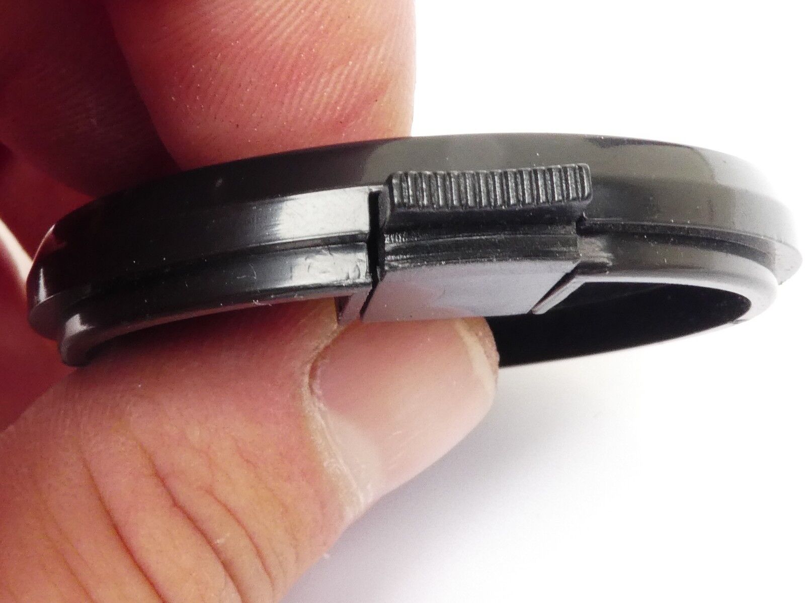 Used 49mm Lens Front Cap Black snap-on type made in Taiwan plastic