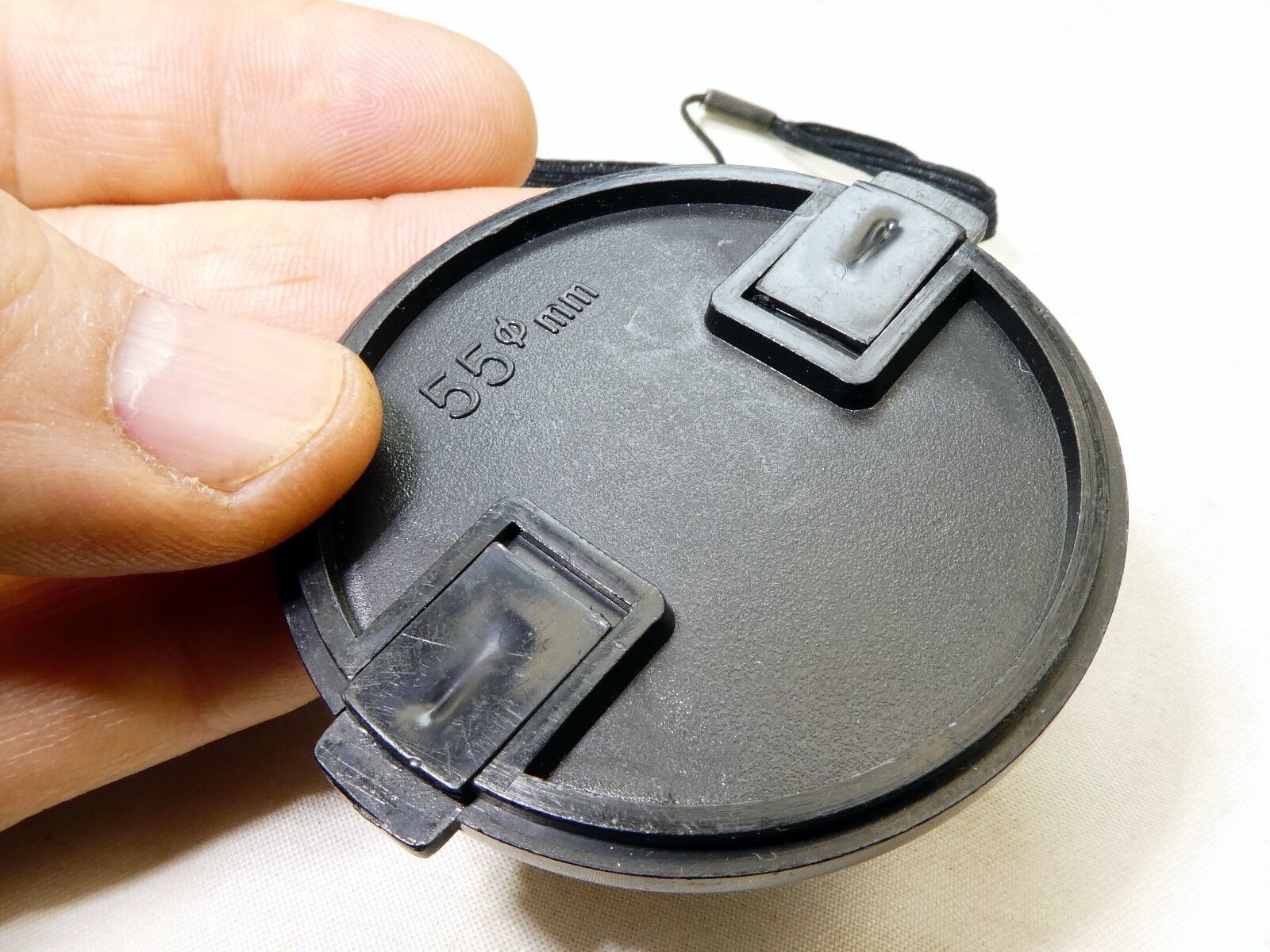 Black 55mm Lens front Cap  Snap on type with keeper string holder