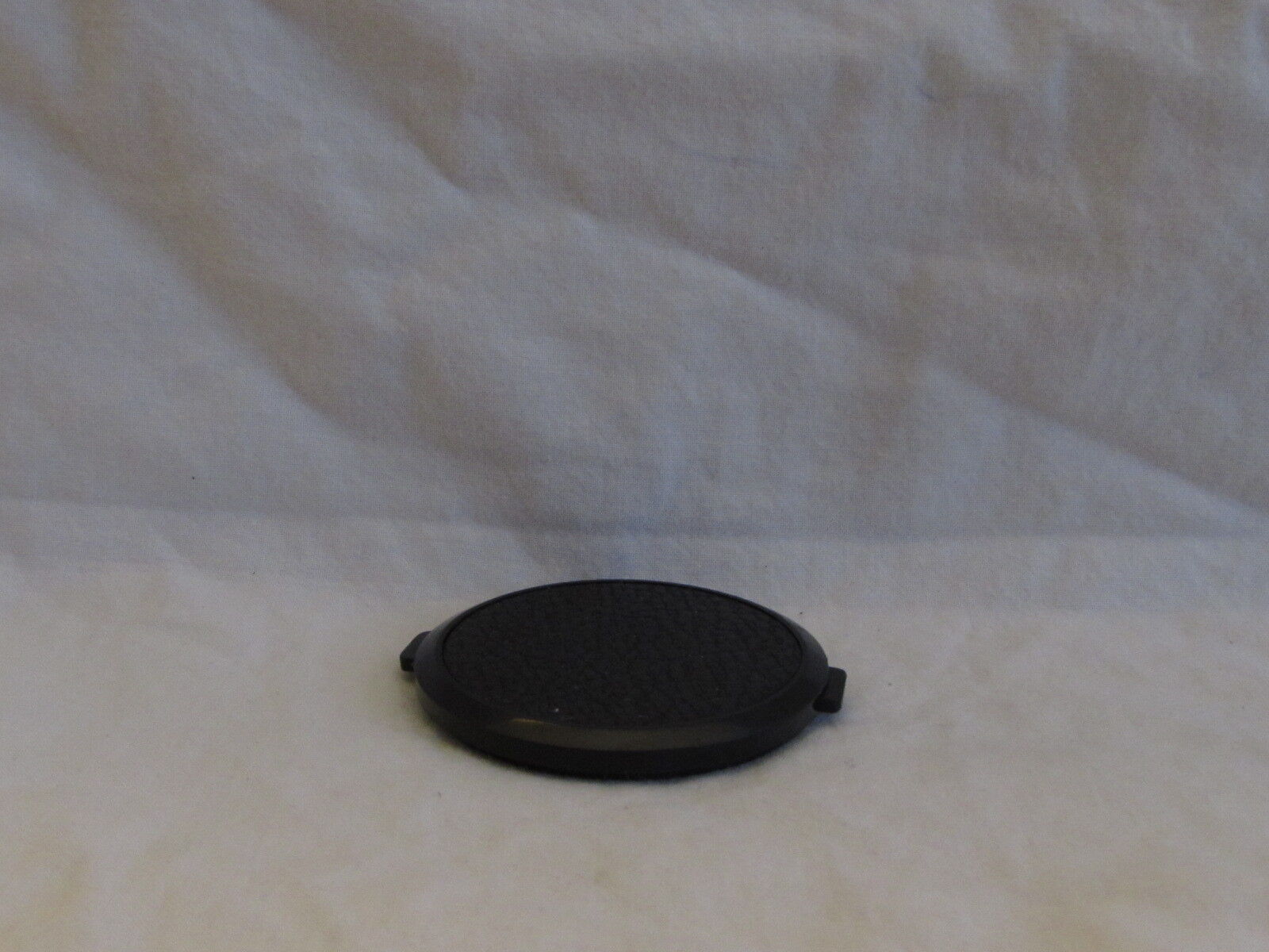 Front  Lens Cap: B21409 52mm Hong Kong