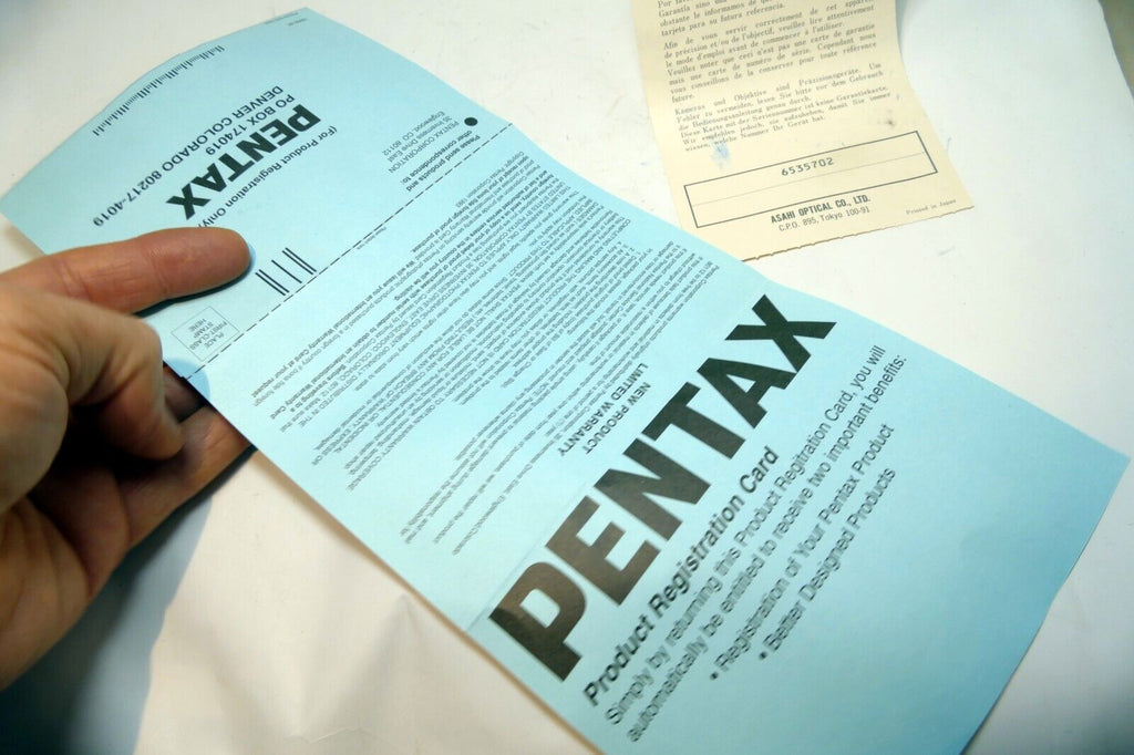 Pentax K1000 camera warranty card vintage 1980's