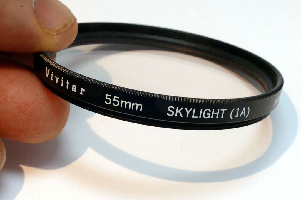 Vivitar  55mm Filter Skylight 1A sky  ( with coating scratched )